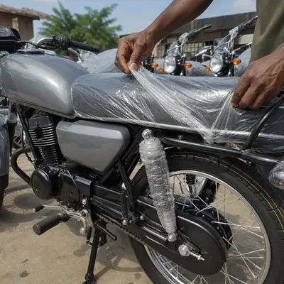 Peeling the factory plastic off the seat of a new motorcycle